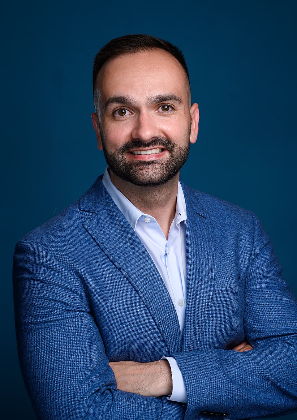 Jonathan's Business Portraits on a Dark Blue Backdrop